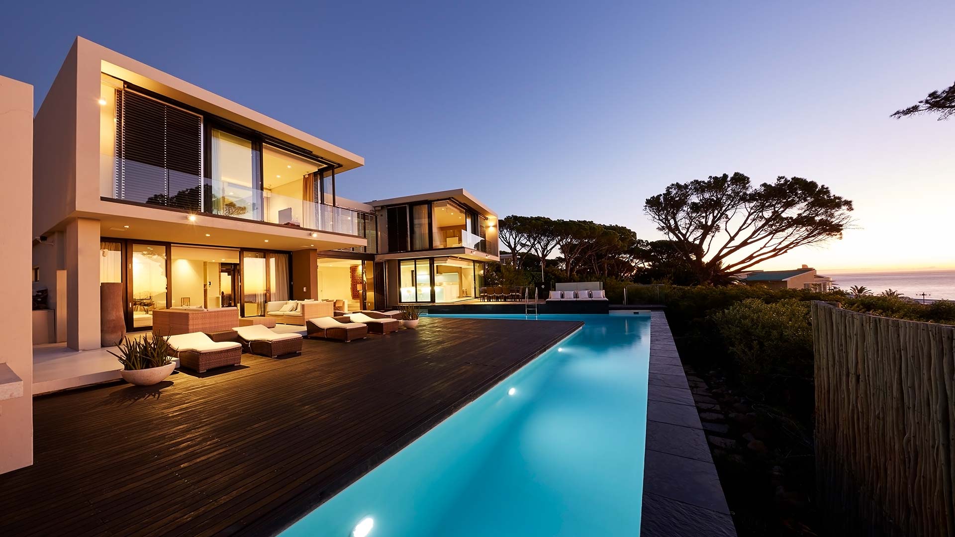 Exterior view of a luxury home at evening